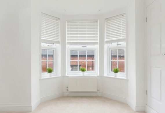 Made-to-measure bay window blinds installed in a Lichfield home by Fine Fit Blinds and Shutters.