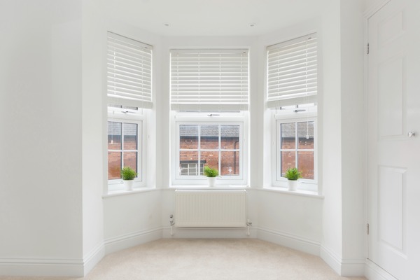 Made-to-measure bay window blinds installed in a Lichfield home by Fine Fit Blinds and Shutters.